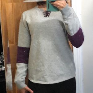 purple and gray sweater